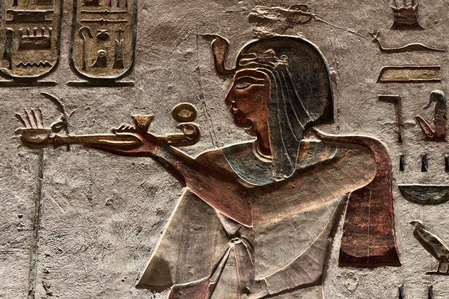 Painted wall relief of an Egyptian figure making an offering, KV11