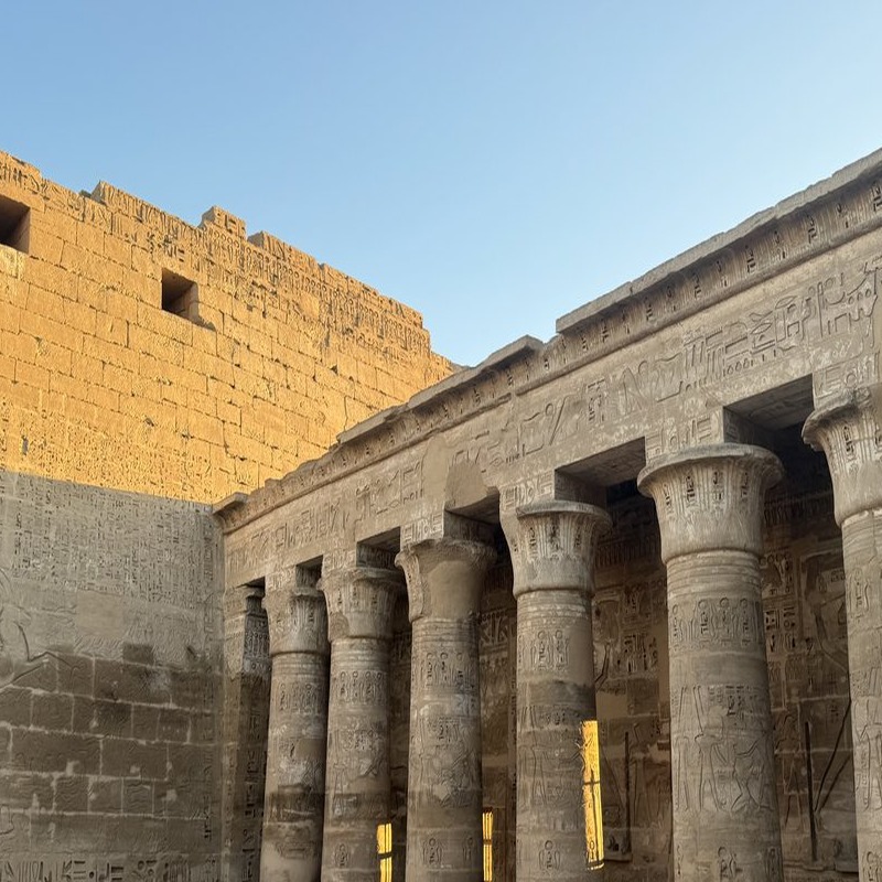 Monumental columns of an Egyptian temple at golden hour, Luxor